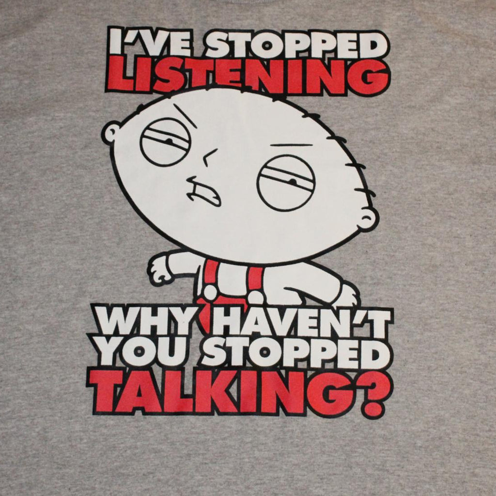 Gray t-shirt with cartoon character and text 'I've stopped listening. Why haven't you stopped talking?' on a white background