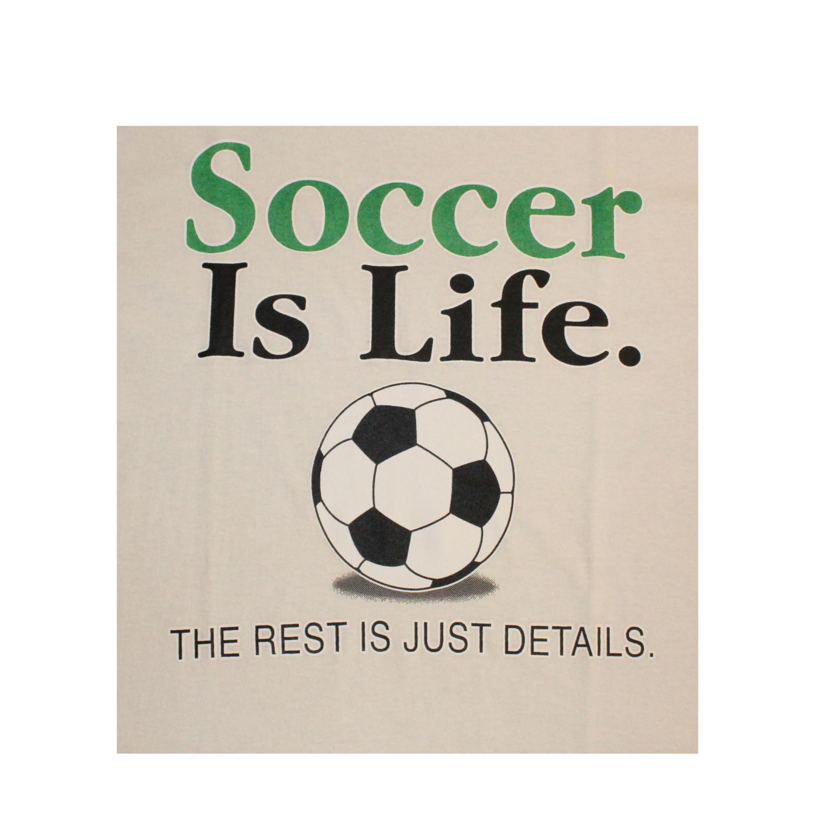 Slogan 'Soccer Is Life. The Rest Is Just Details.' with a soccer ball graphic on a beige background.