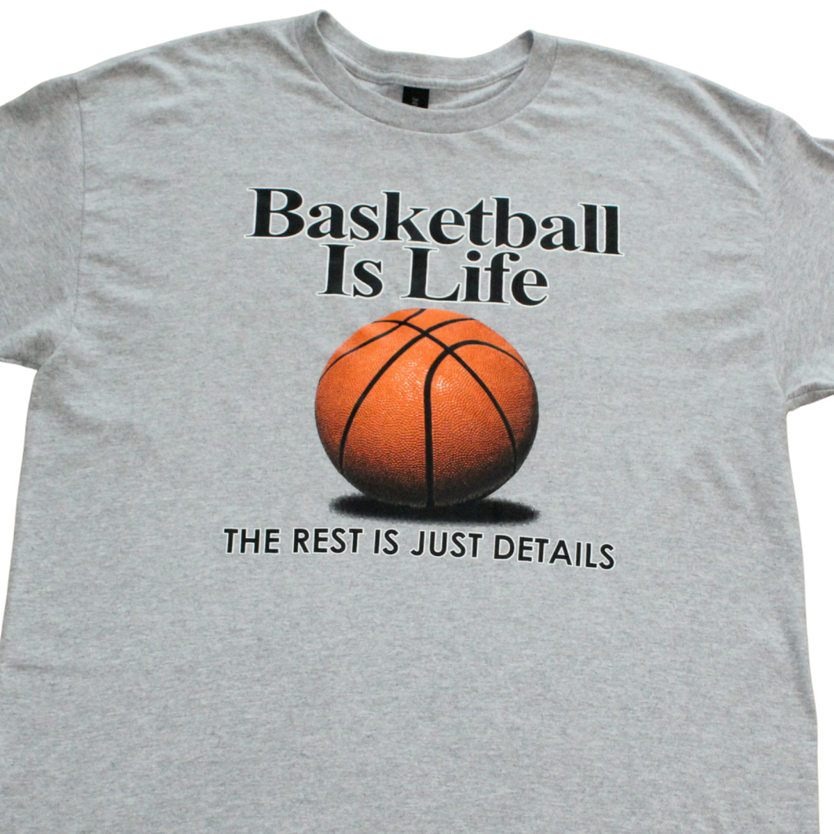 Basketball Is Life sports graphic t-shirt on black tee, front view