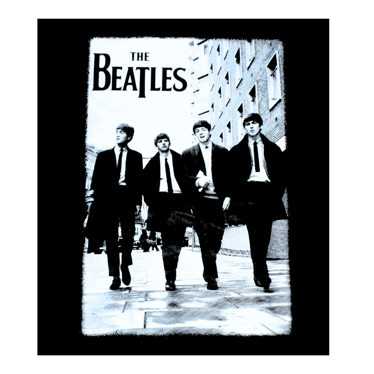 Black and white photo of The Beatles walking together with 'The Beatles' text above.